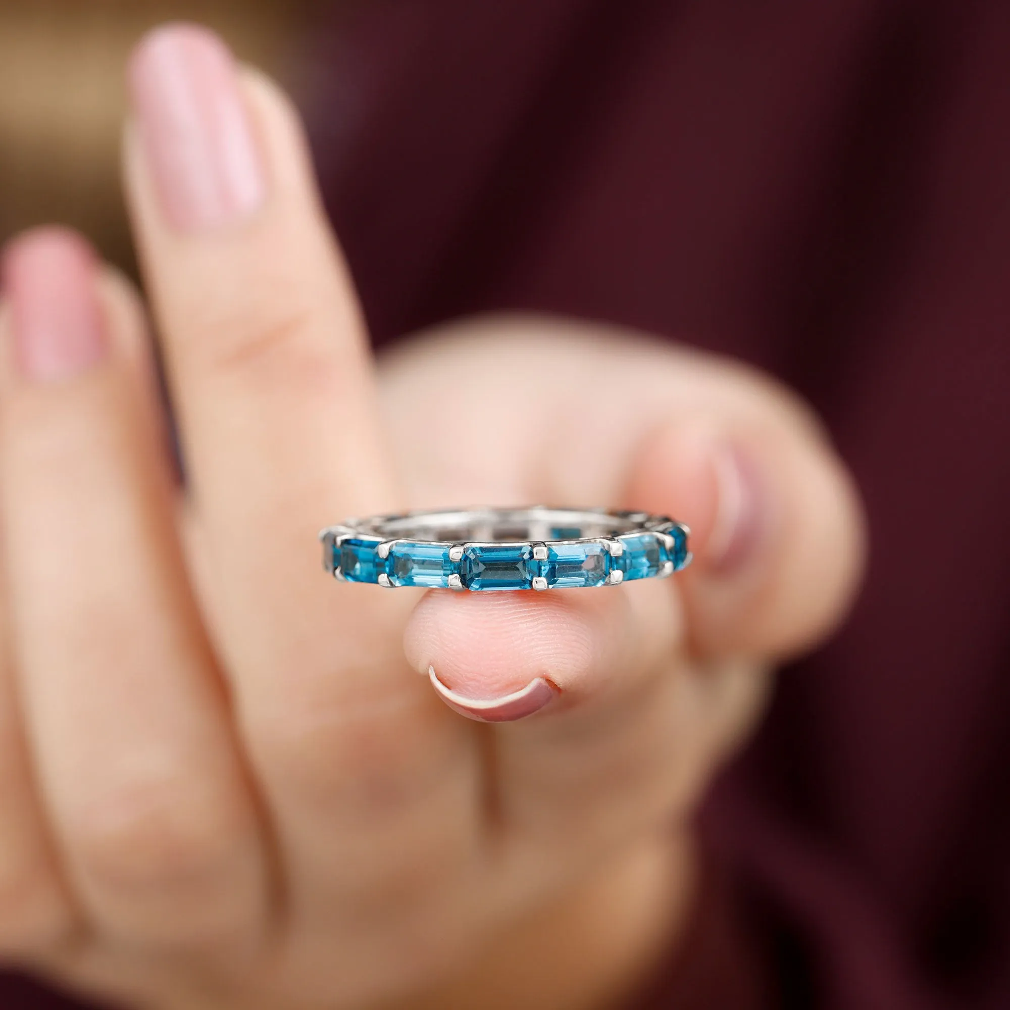 Shared Prong Set Octagon Cut London Blue Topaz Eternity Ring