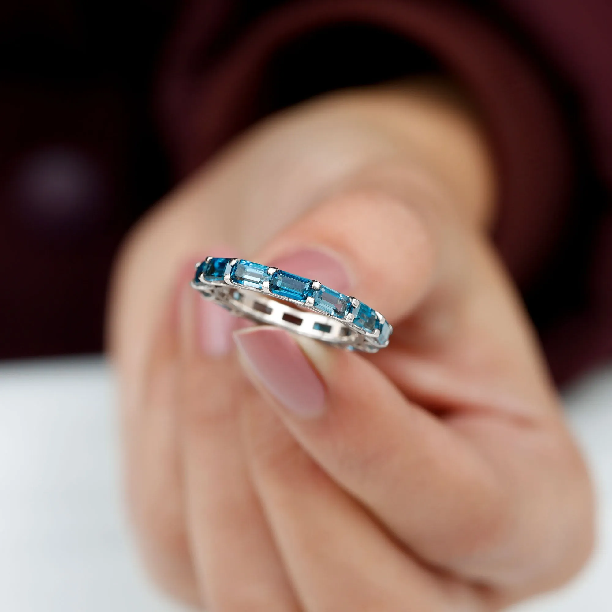 Shared Prong Set Octagon Cut London Blue Topaz Eternity Ring