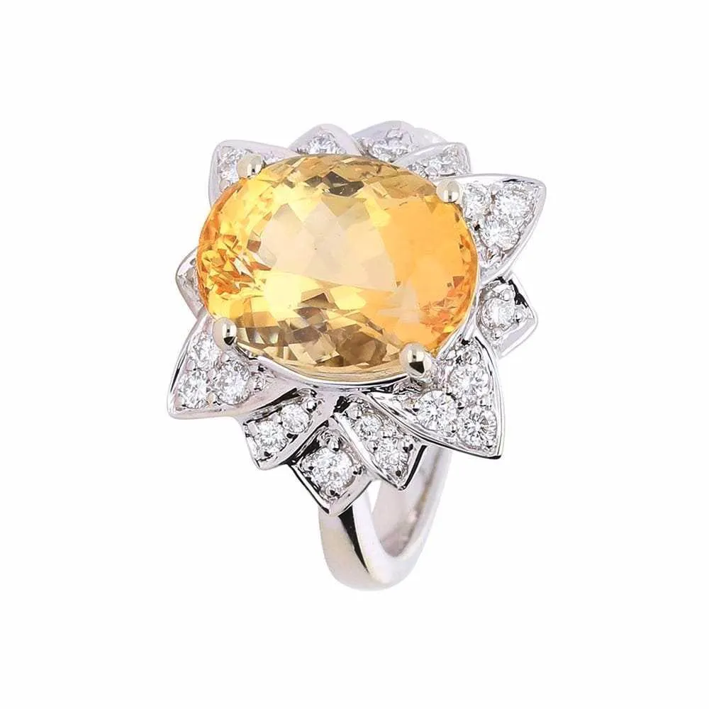 White gold imperial topaz ring set with a floral diamond surround